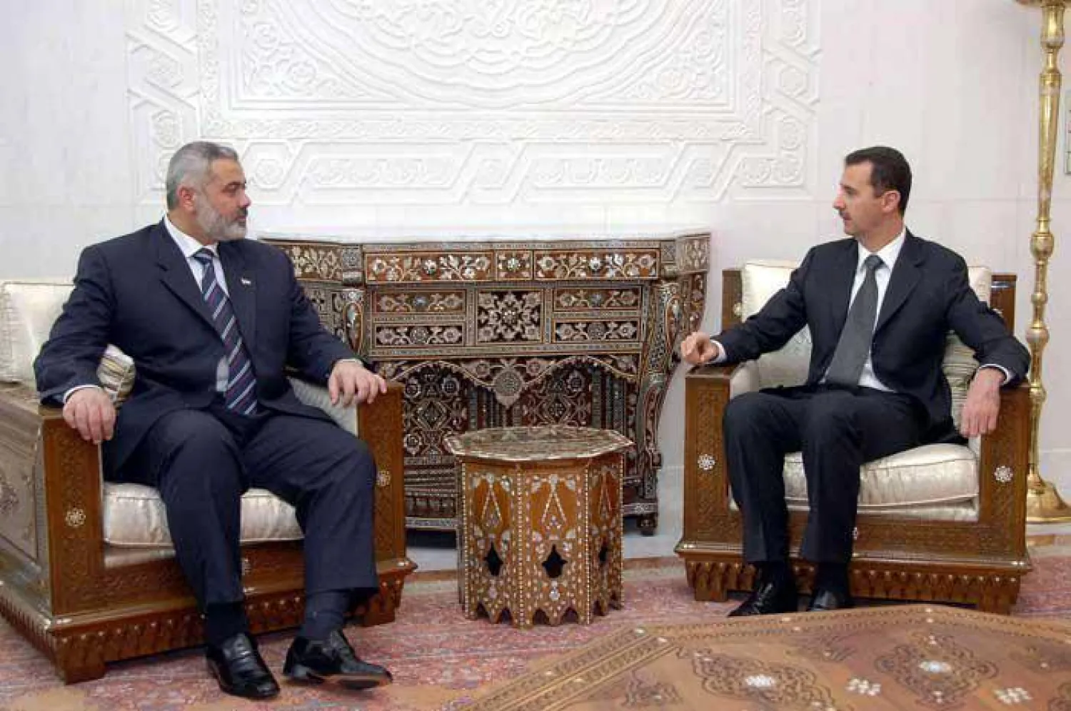 Syrian President Bashar al-Assad receiving then-Palestinian National Authority Ismail Haniyeh of Hamas in Dec. 2006. (AFP file photo)
