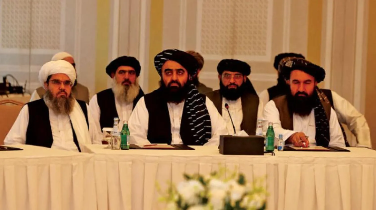 Geçtiğimiz yıl Ekim ayında Katar'ın başkenti Doha'da ABD’li yetkililerle bir araya gelen Taliban’ın üst düzey isimleri (Getty)