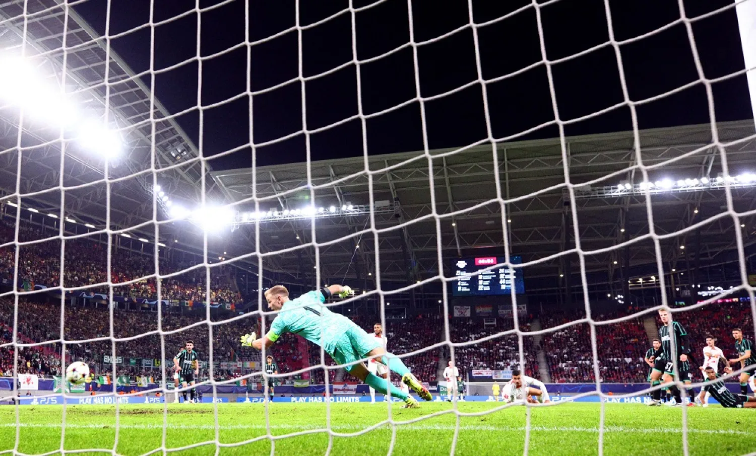 Football - Champions League - Group F - RB Leipzig v Celtic - Red Bull Arena, Leipzig, Germany - October 5, 2022 RB Leipzig's Dominik Szoboszlai scores their second goal past Celtic's Joe Hart but it was later disallowed. (Reuters)
