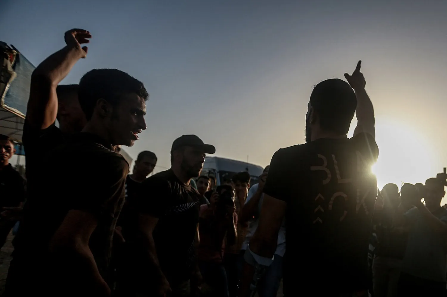 26 September 2022, Palestinian Territories, Gaza: Palestinians take part in a demonstration near the border fence with Israel, east of Gaza City. (dpa)