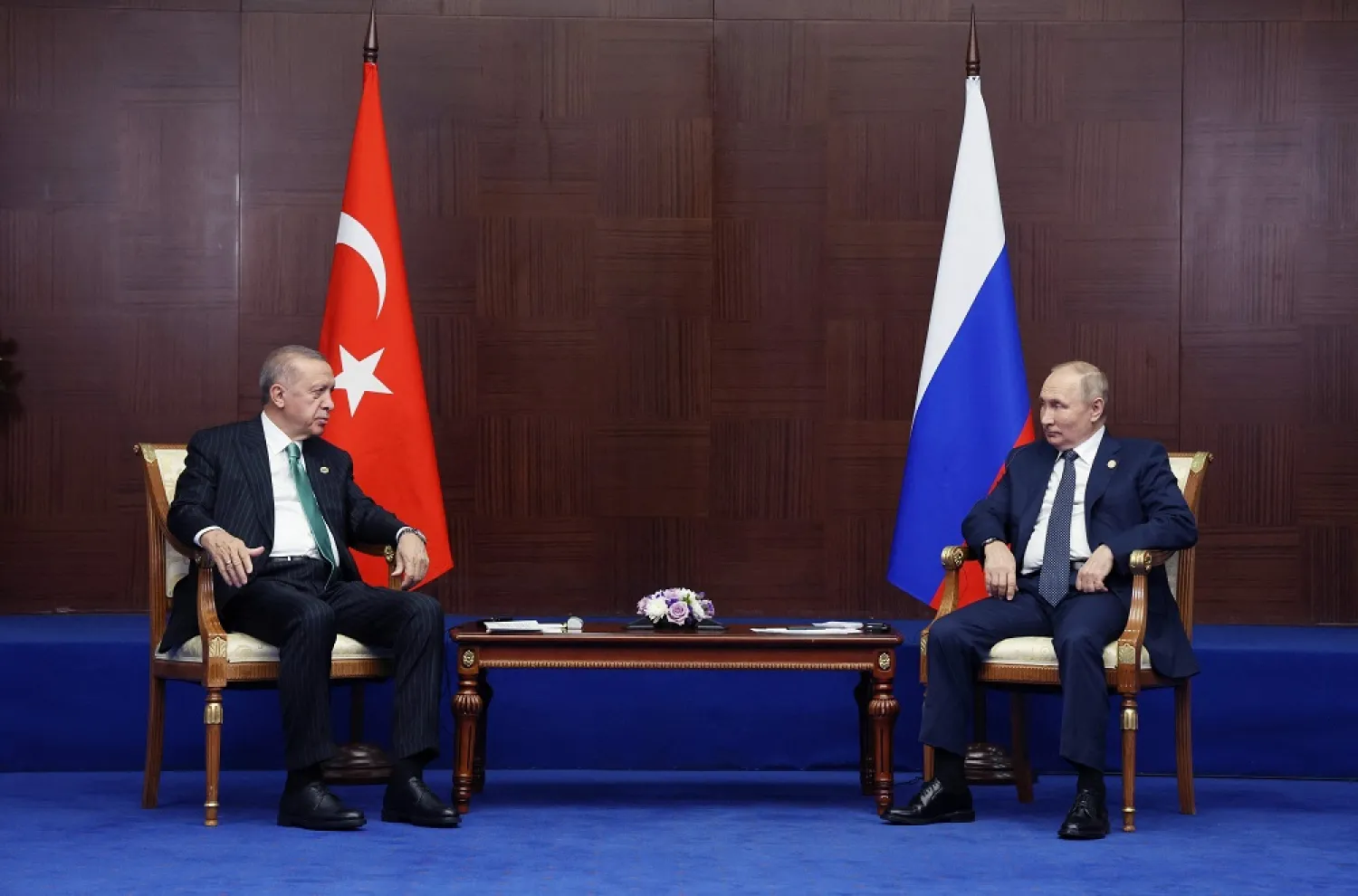Russian President Vladimir Putin meets with Turkey's President Recep Tayyip Erdogan on the sidelines of the Sixth Summit of the Conference on Interaction and Confidence Building Measures in Asia (CICA) in Astana on October 13, 2022. (AFP)