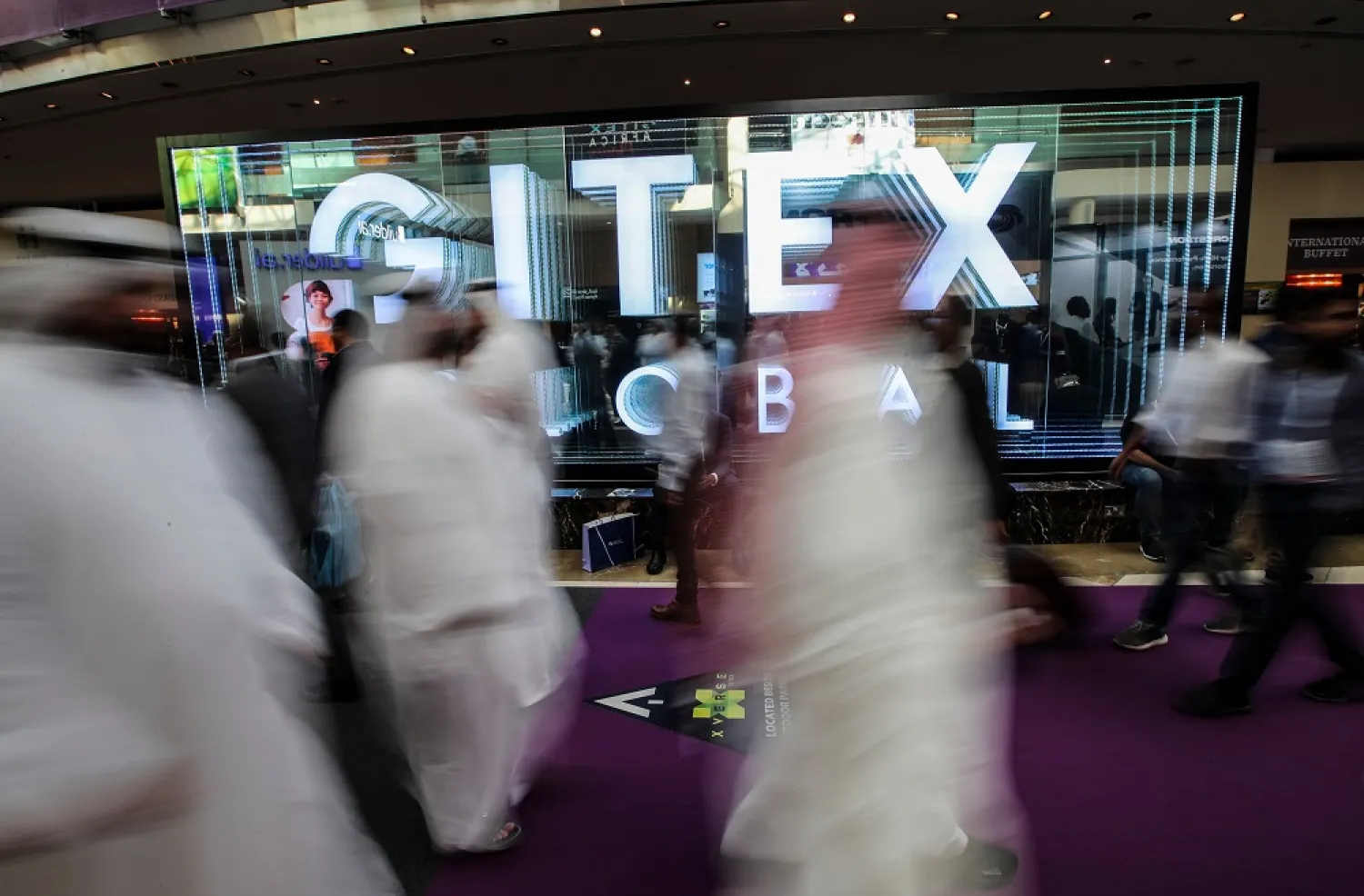 People visit the Gulf Information Technology Exhibition (GITEX) Global 2022 in the Gulf emirate of Dubai, United Arab Emirates, 13 October 2022. (EPA)