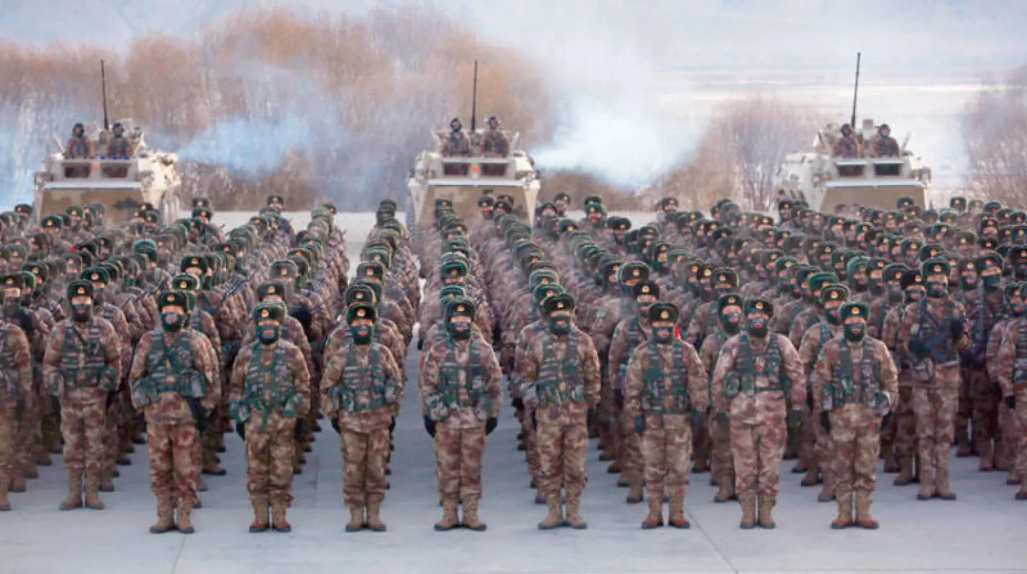 جنود صينيون يشاركون في تدريب عسكري بجبال كاشغار شمال غرب الصين في يناير 2021 (أ.ف.ب)