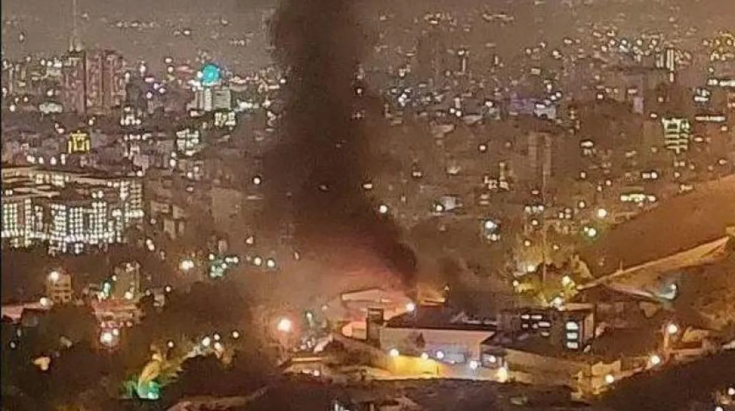 Flames and a plume of smoke could be seen billowing into the night sky. (Iranian media)