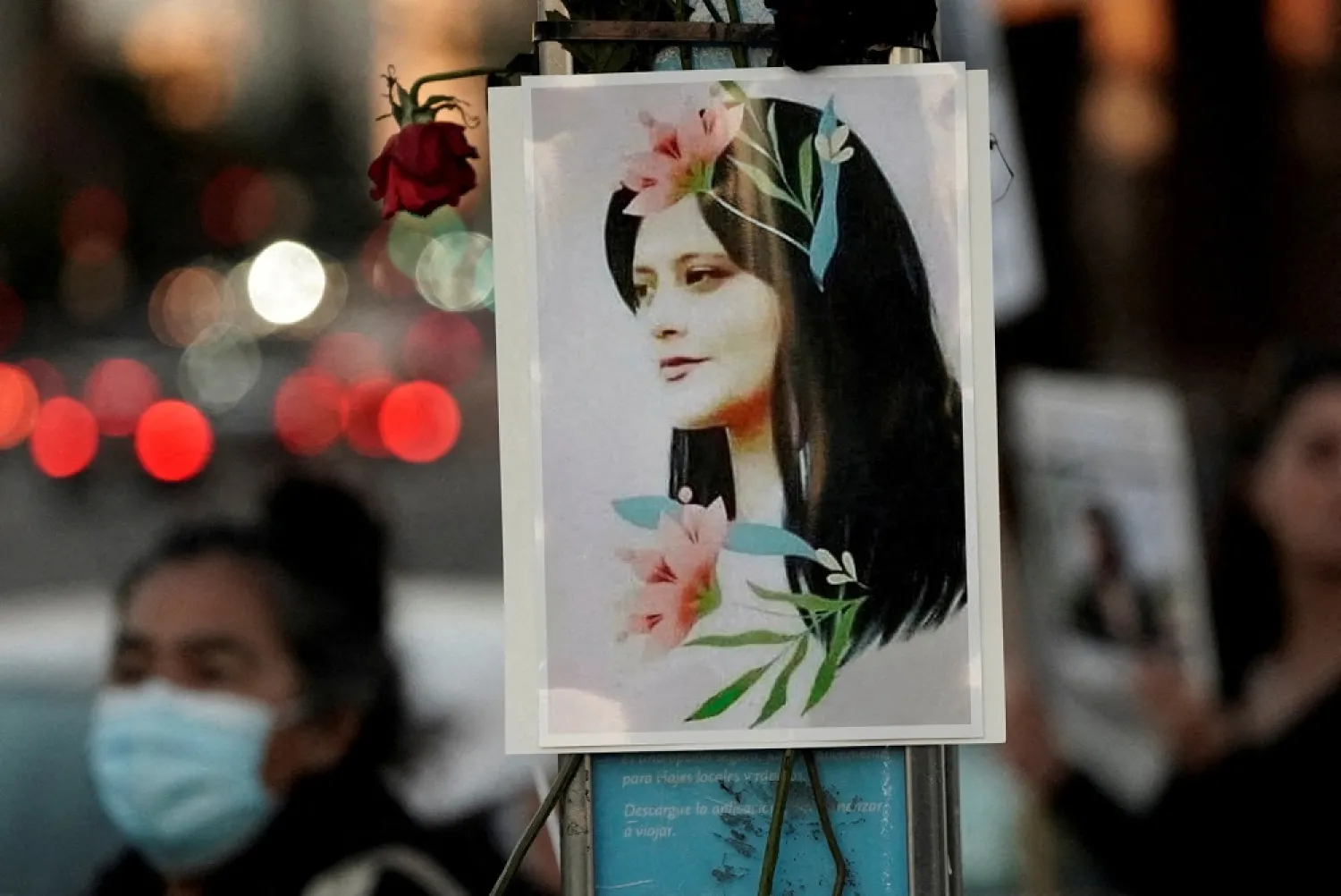 An image of Mahsa (Zhina) Amini, an Iranian Kurdish woman, is displayed on a pole during a protest following her death, in Los Angeles, California, US, September 22, 2022. (Reuters)