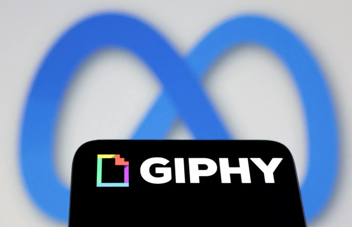 The Meta and Giphy logos are seen in this illustration taken June 16, 2022. (Reuters)