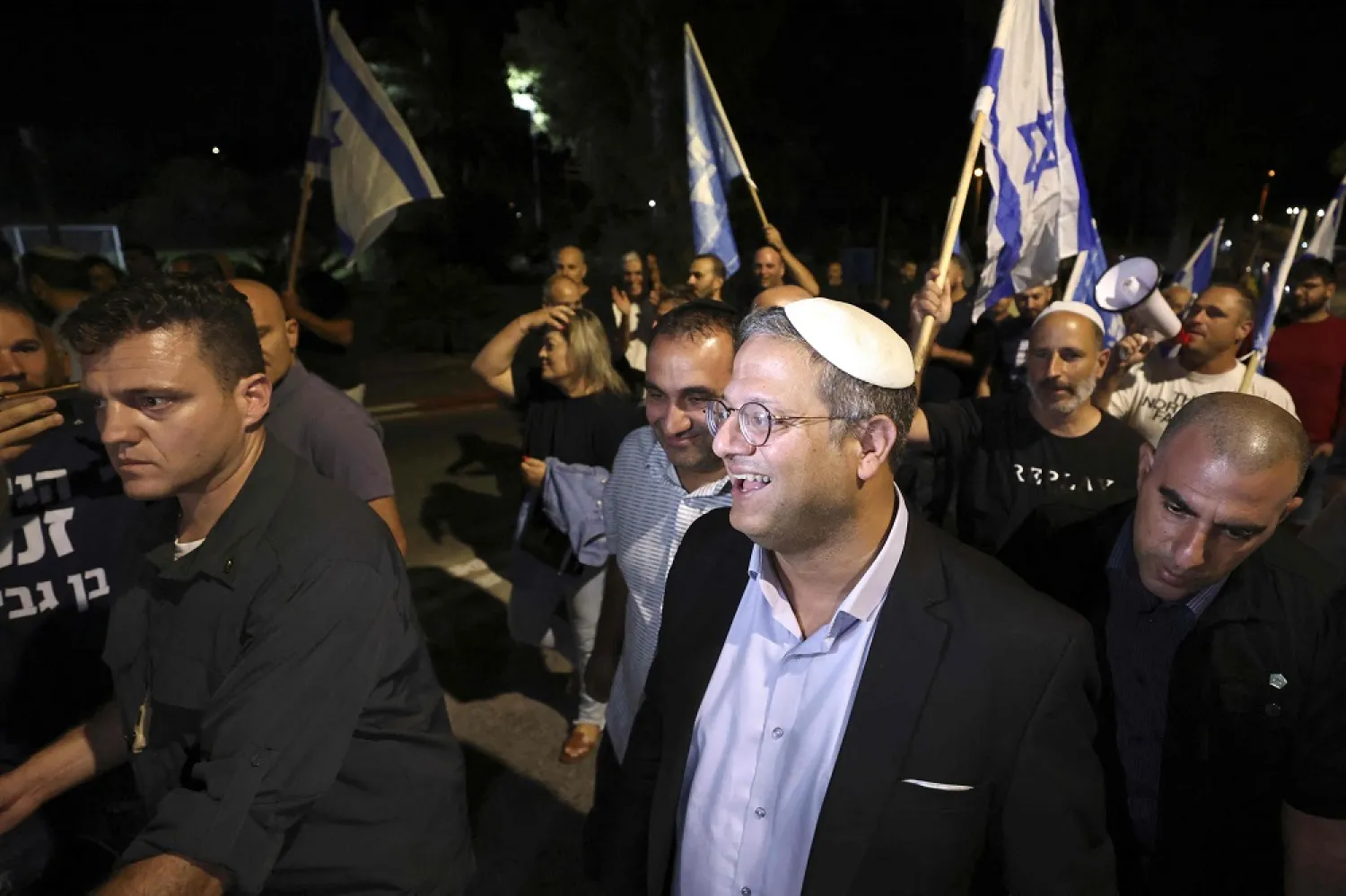 Itamar Ben-Gvir, Israeli far-right lawmaker and leader of the Otzma Yehudit (Jewish power) party, attends a campaign event in the northern Israel Kibbutz of Ayelet Hashahar on October 6, 2022. (AFP)