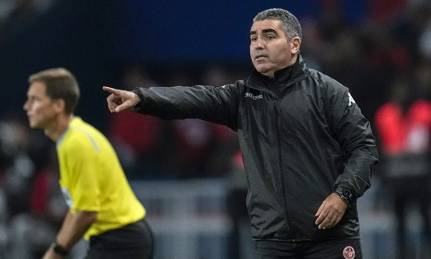 Tunisia's coach Jalel Kadri gestures during the international friendly match between Brazil and Tunisia at the Parc des Princes stadium in Paris, France, Tuesday, Sept. 27, 2022. (AP)