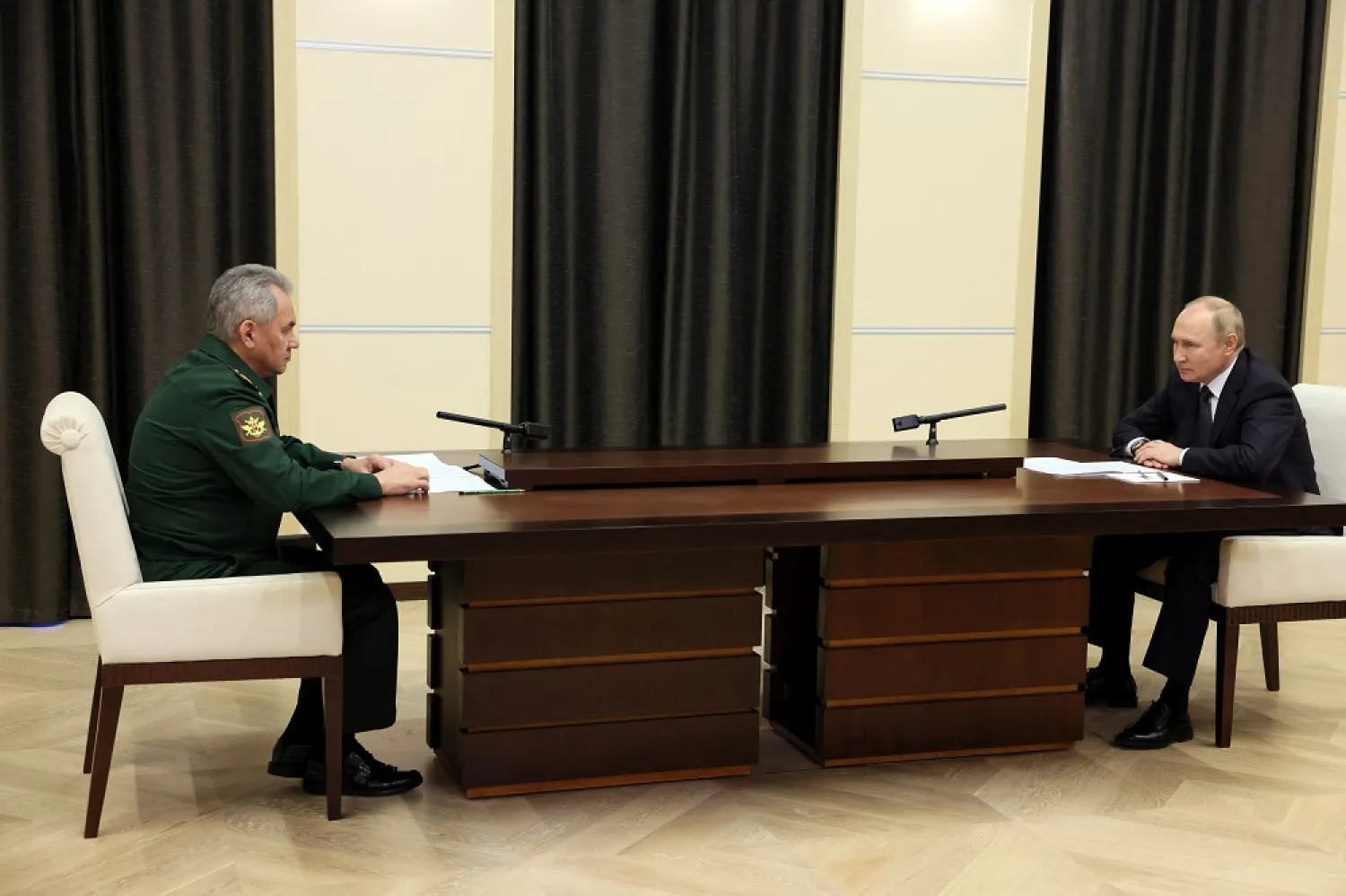 Russian President Vladimir Putin attends a meeting with Defense Minister Sergei Shoigu at the Novo-Ogaryovo state residence, outside Moscow, Russia, October 28, 2022. (Sputnik/Mikhail Metzel/Handout via Reuters)