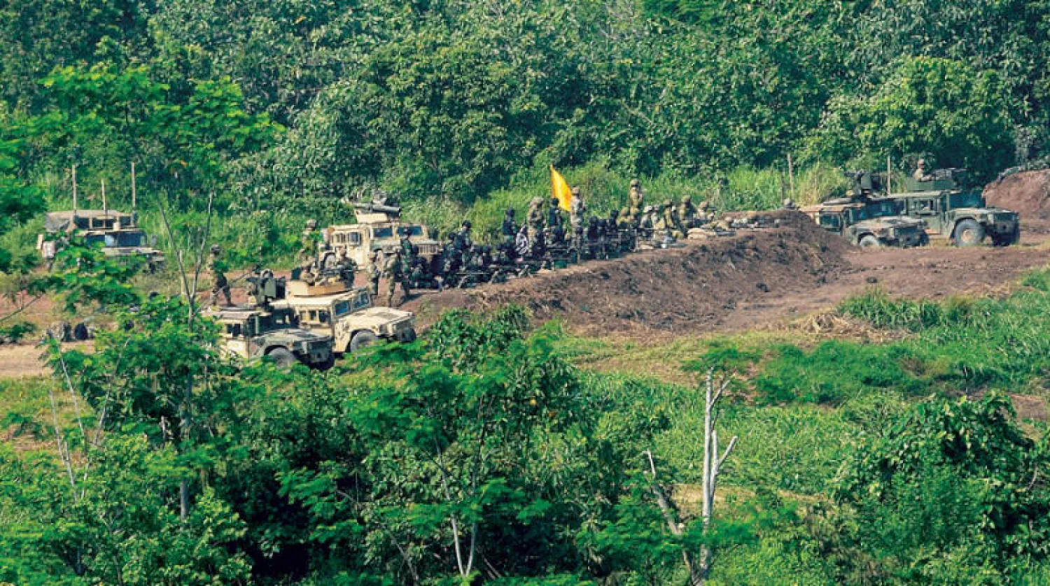 من التدريبات التي أجرتها الجزيرة بعد تصاعد التهديدات الصينية (إ.ب.أ)