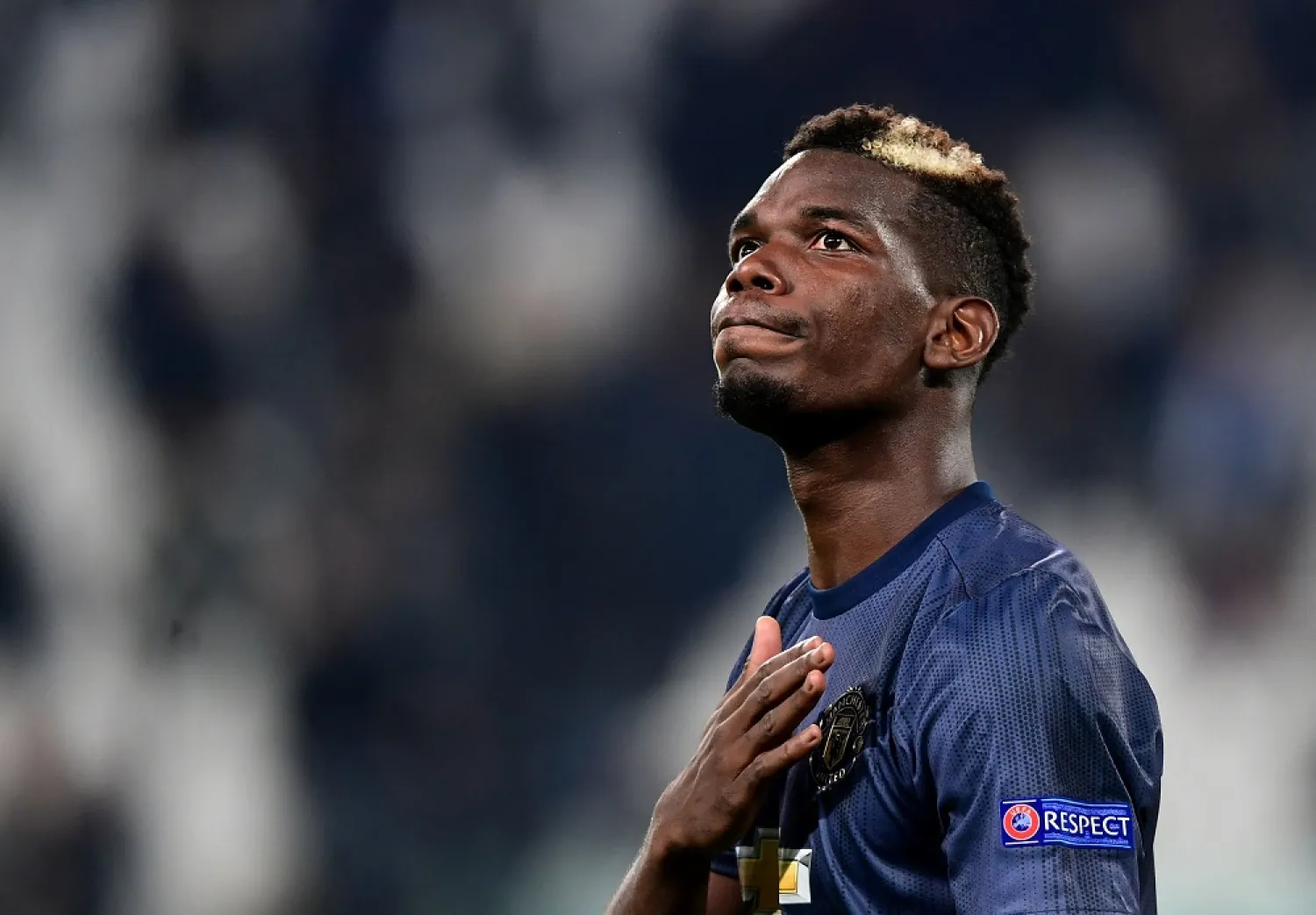 In this file photo taken on November 07, 2018 Manchester United's French midfielder Paul Pogba acknowledges the public at the end of the UEFA Champions League group H football match Juventus vs Manchester United at the Allianz stadium in Turin. (AFP)