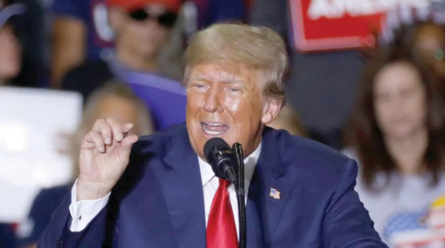 Donald Trump, 1 Ekim’de Michigan eyaletindeki bir mitingde konuşma yaptı. (AFP)