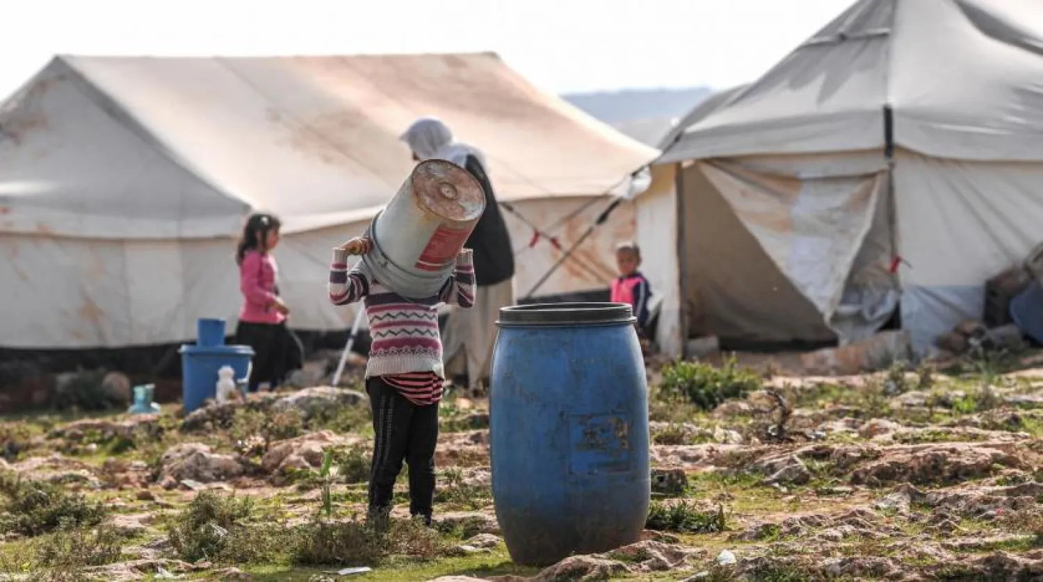 Syrians displaced by regime bombardment have sought shelter in squalid camps along the border with Türkiye | AFP
