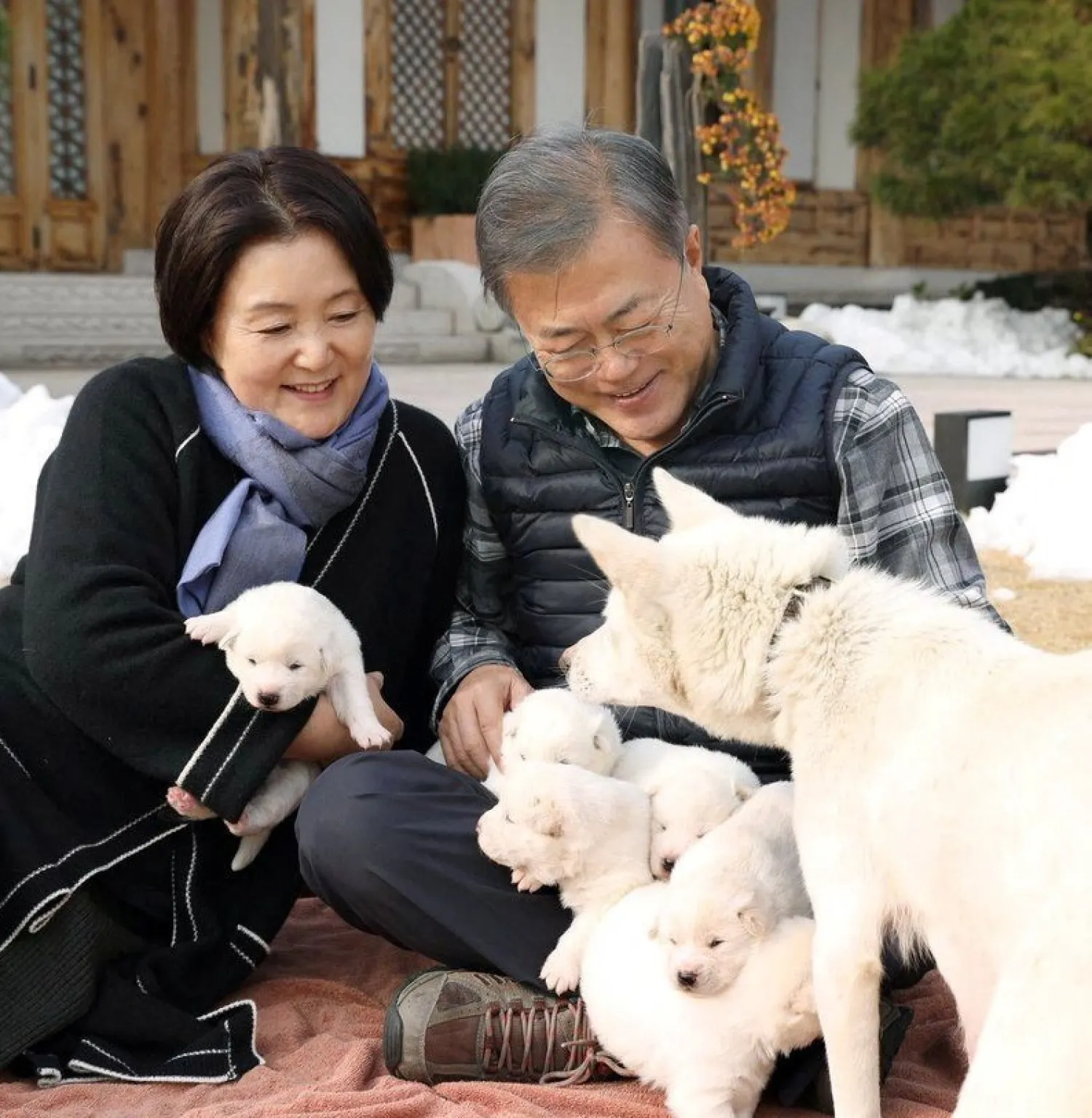 South Korean President Moon Jae-in and first lady Kim Jung-sook hold puppies born from a hunting dog gifted from North Korea, in Seoul, South Korea November 25, 2018 in this image obtained November 27, 2018 from South Korean Presidential Office/Handout/via Reuters