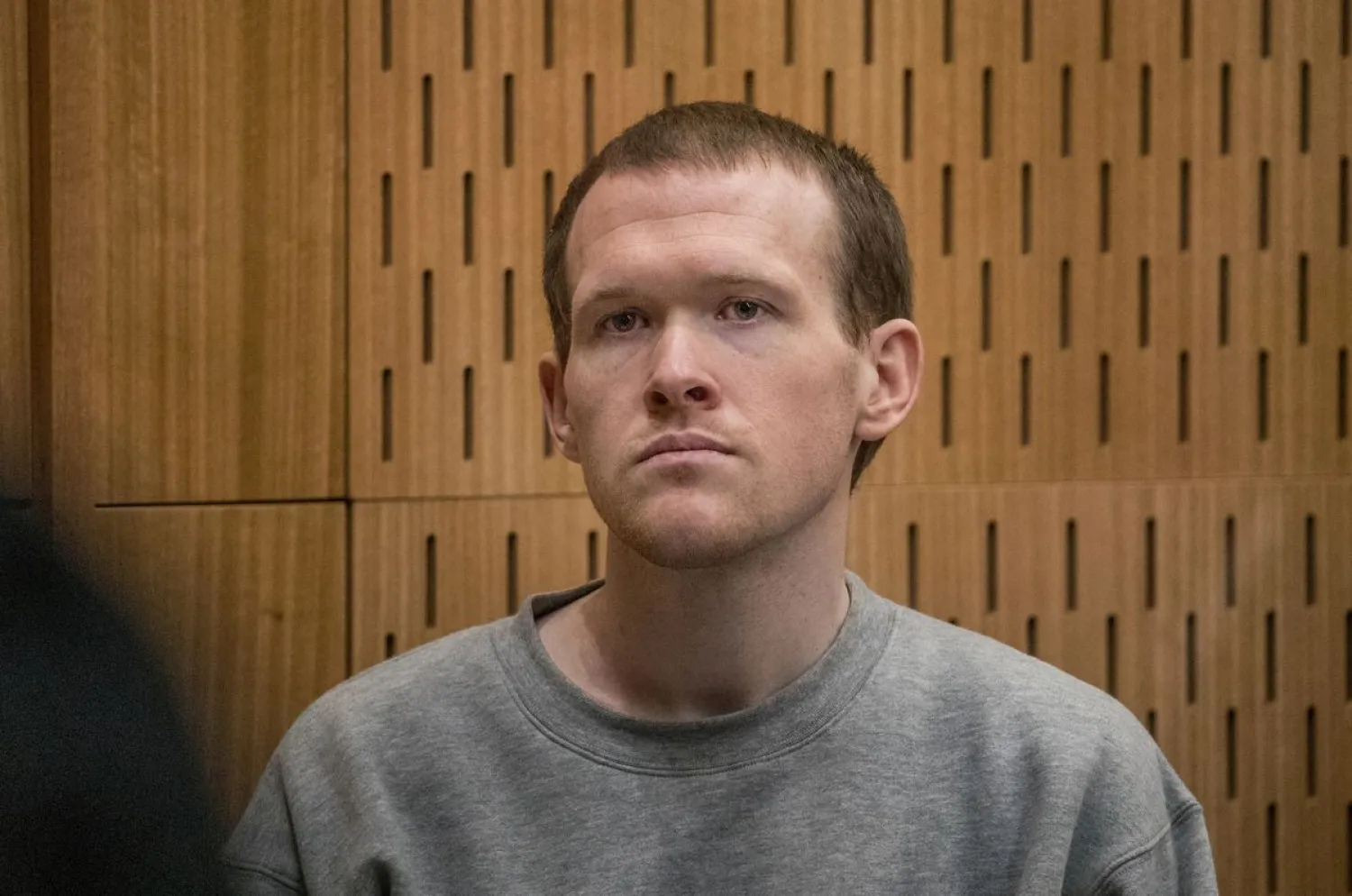 Brenton Tarrant, the gunman who shot and killed worshippers in the Christchurch mosque attacks, listens as Crown prosecutor Mark Zarifeh delivers his submission during Tarrant's sentencing at the High Court in Christchurch, New Zealand, August 27, 2020. John Kirk-Anderson/Pool via REUTERS