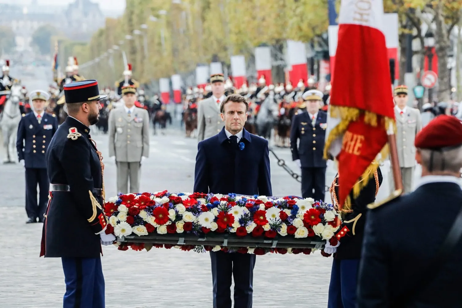 France's President Emmanuel Macron attends a ceremony at the Arc de Triomphe in Paris on November 11, 2022, as part of commemorations marking the 104th anniversary of the November 11, 1918 Armistice, ending World War I (WWI). (AFP)