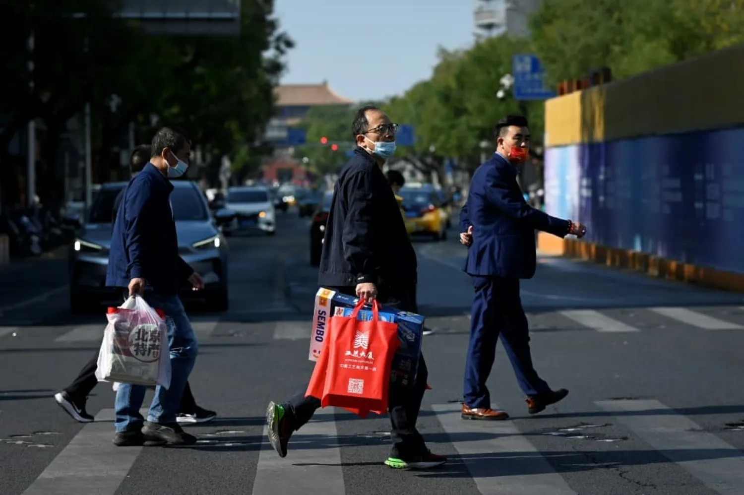 China's shopping sales from the Singles Day holiday could top a record one trillion yuan ($140 billion) despite the country's struggling economy. Photo: WANG Zhao / AFP 