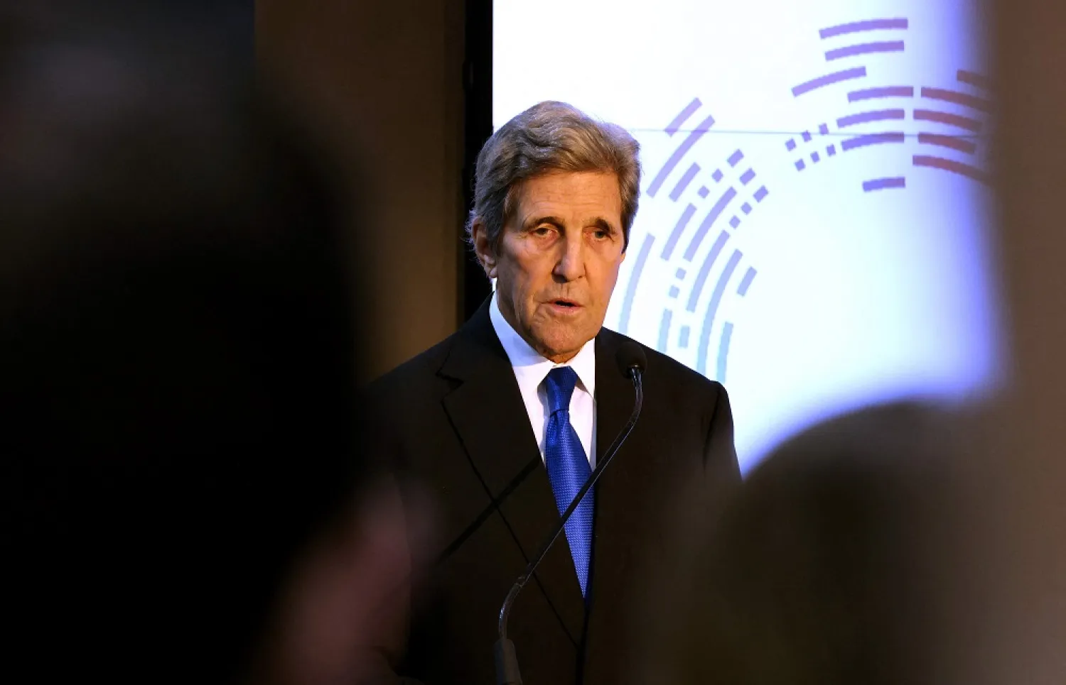 US climate envoy John Kerry delivers a speech during a discussion about oceans and water at the US pavilion in the Sharm el-Sheikh International Convention Center, in Egypt's Red Sea resort city of the same name, during the COP27 climate conference on November 15, 2022. (AFP)