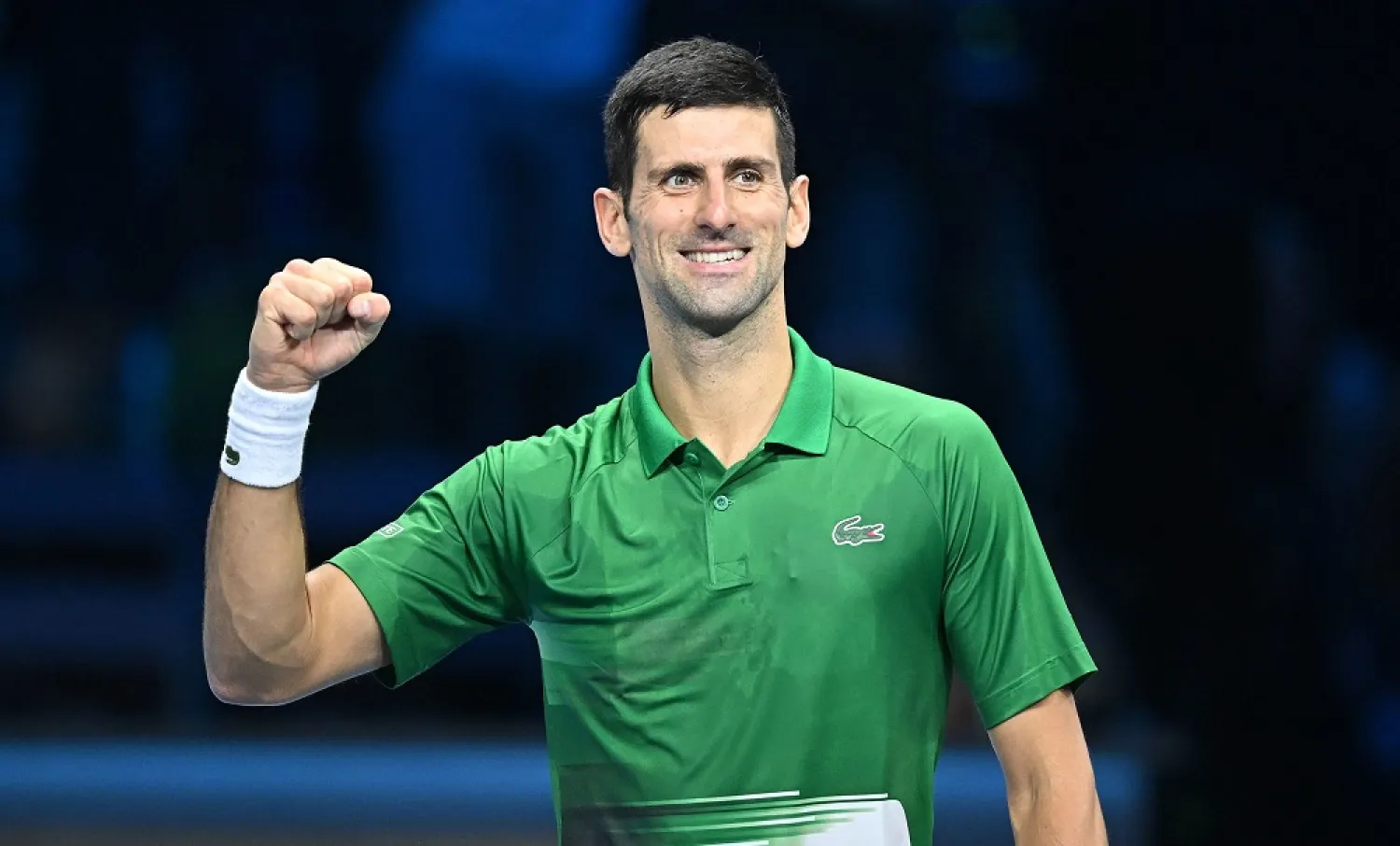 Novak Djokovic of Serbia reacts during the Singles red group round robin match against Andrey Rublev of Russia at the ATP Finals 2022 in Turin, Italy, 16 November 2022. (EPA)