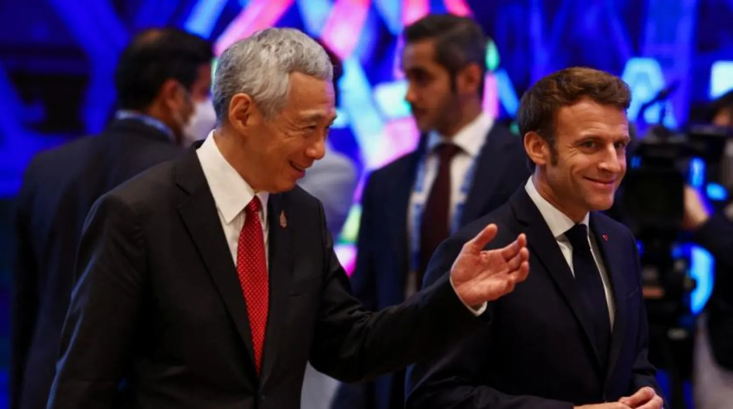 Singapore Prime Minister Lee Hsien Loong and France's President Emmanuel Macron attend the APEC Leaders' Informal Dialogue with Guests during the Asia-Pacific Economic Cooperation (APEC) Summit 2022, in Bangkok, Thailand November 18, 2022. REUTERS/Athit Perawongmetha/Pool