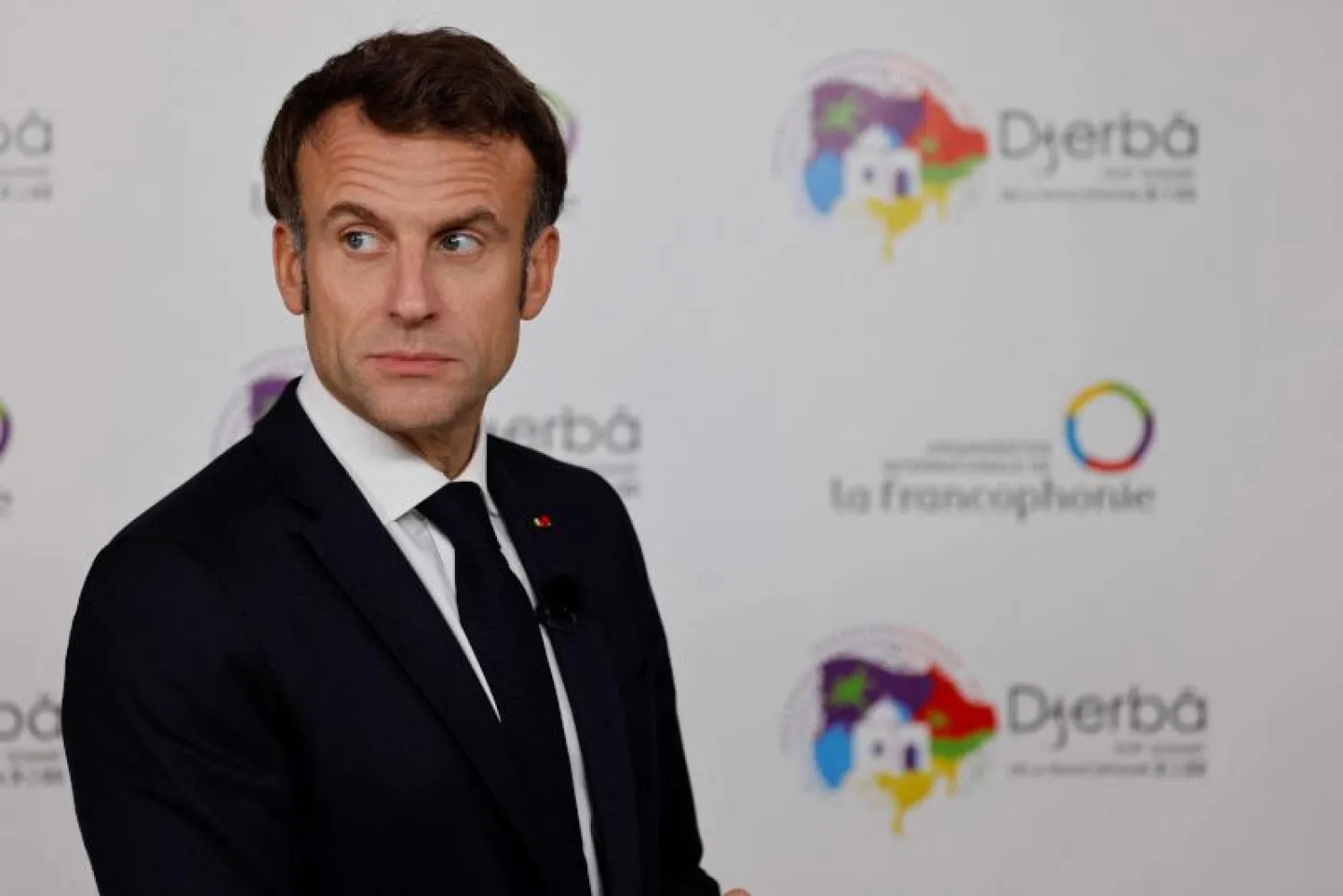 الرئيس الفرنسي إيمانويل ماكرون خلال القمة الفرنكوفونية في تونس السبت (أ.ف.ب)