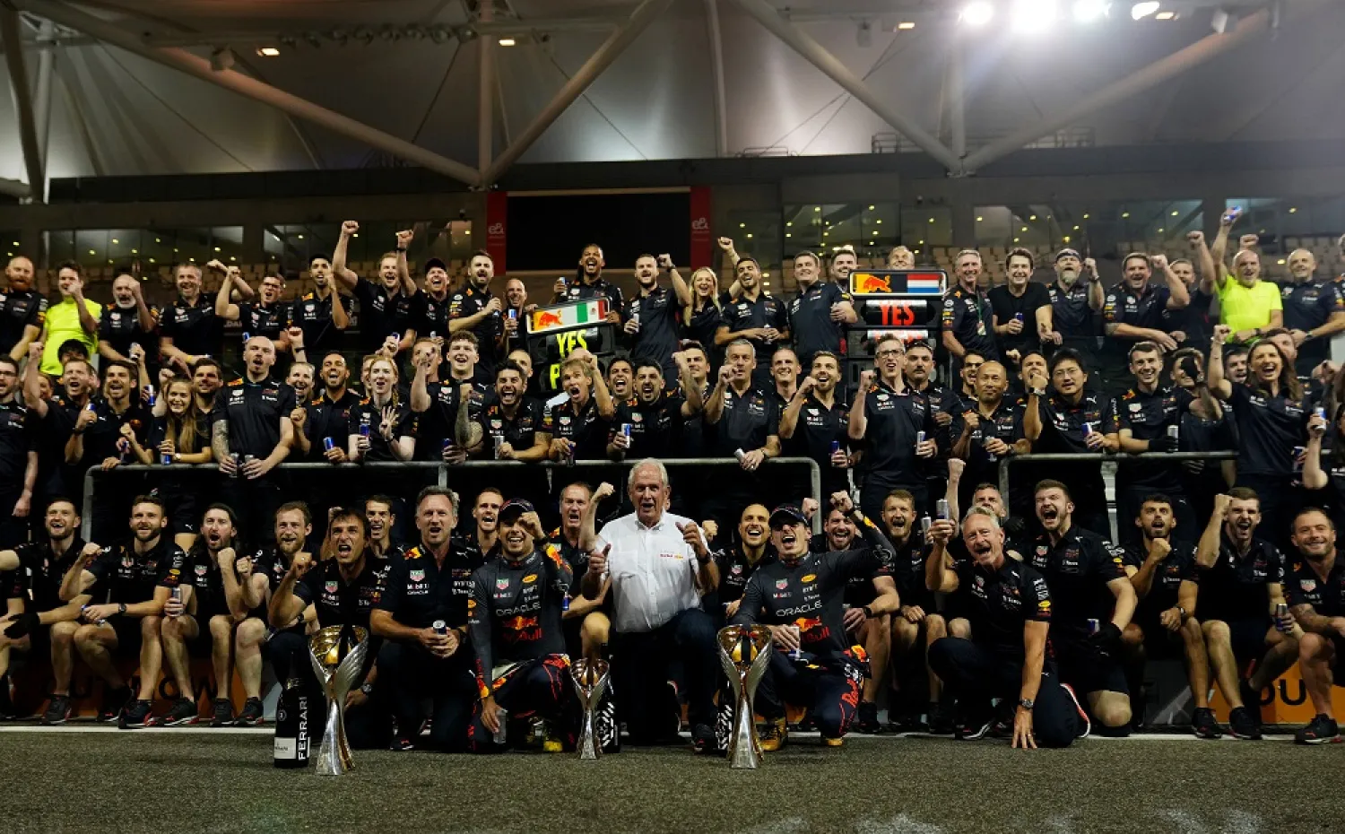 Formula One F1 - Abu Dhabi Grand Prix - Yas Marina Circuit, Abu Dhabi, United Arab Emirates - November 20, 2022 Red Bull team principal Christian Horner, Sergio Perez, advisor Helmut Marko, Max Verstappen and the Red bull team staff celebrate as the pose for a photograph after the Abu Dhabi Grand Prix. (Reuters)