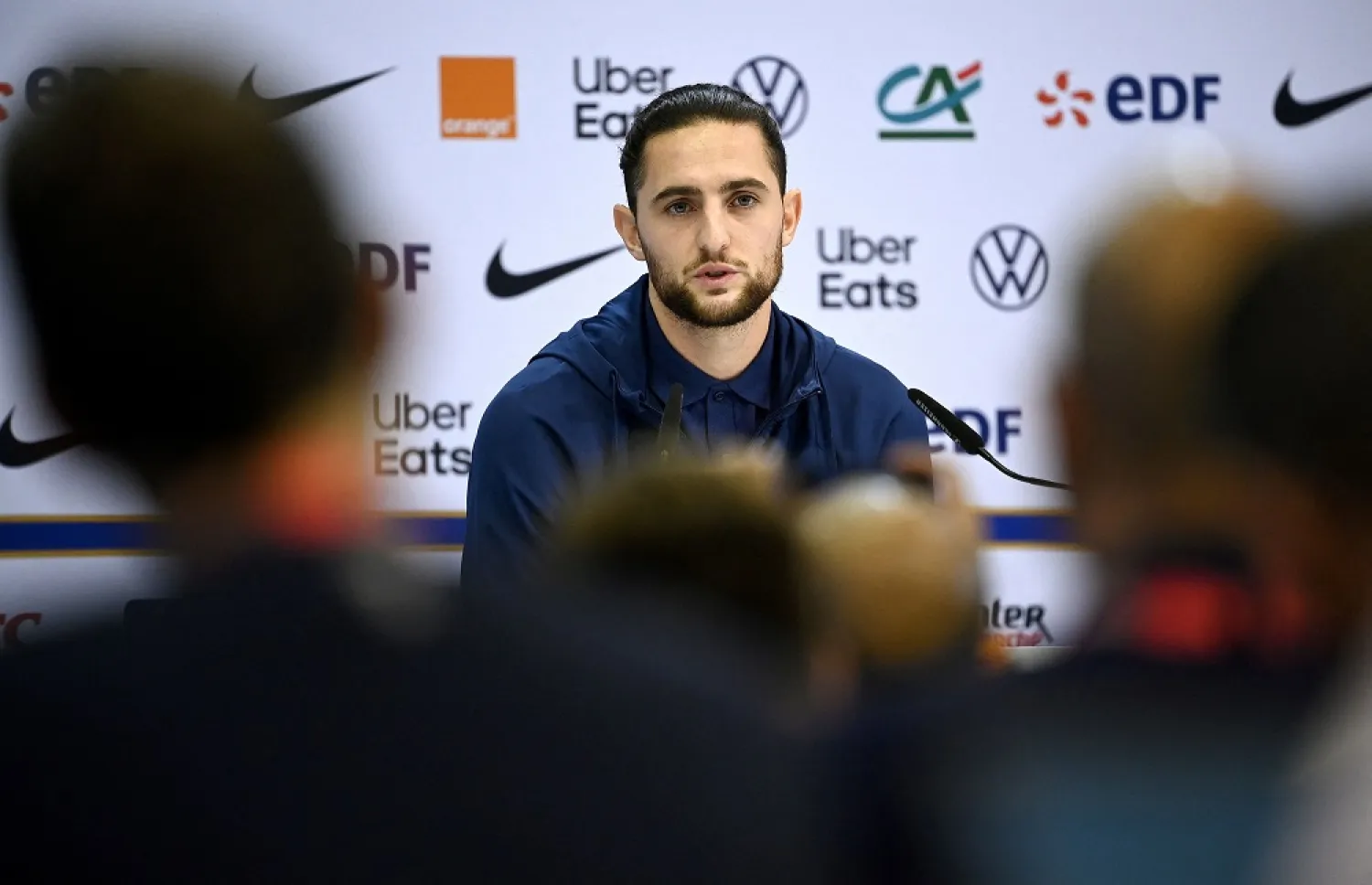 France's midfielder Adrien Rabiot gives a press conference at the Jassim-bin-Hamad Stadium in Doha on November 18, 2022, ahead of the Qatar 2022 World Cup football tournament. (AFP)