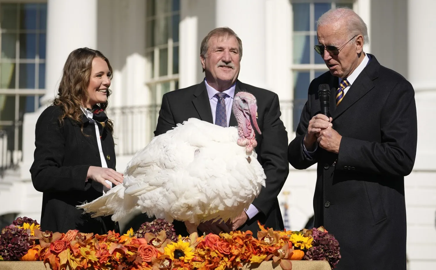 President Joe Biden pardons Chocolate, the national Thanksgiving turkey, at the White House in Washington, Monday, Nov. 21, 2022. (AP)
