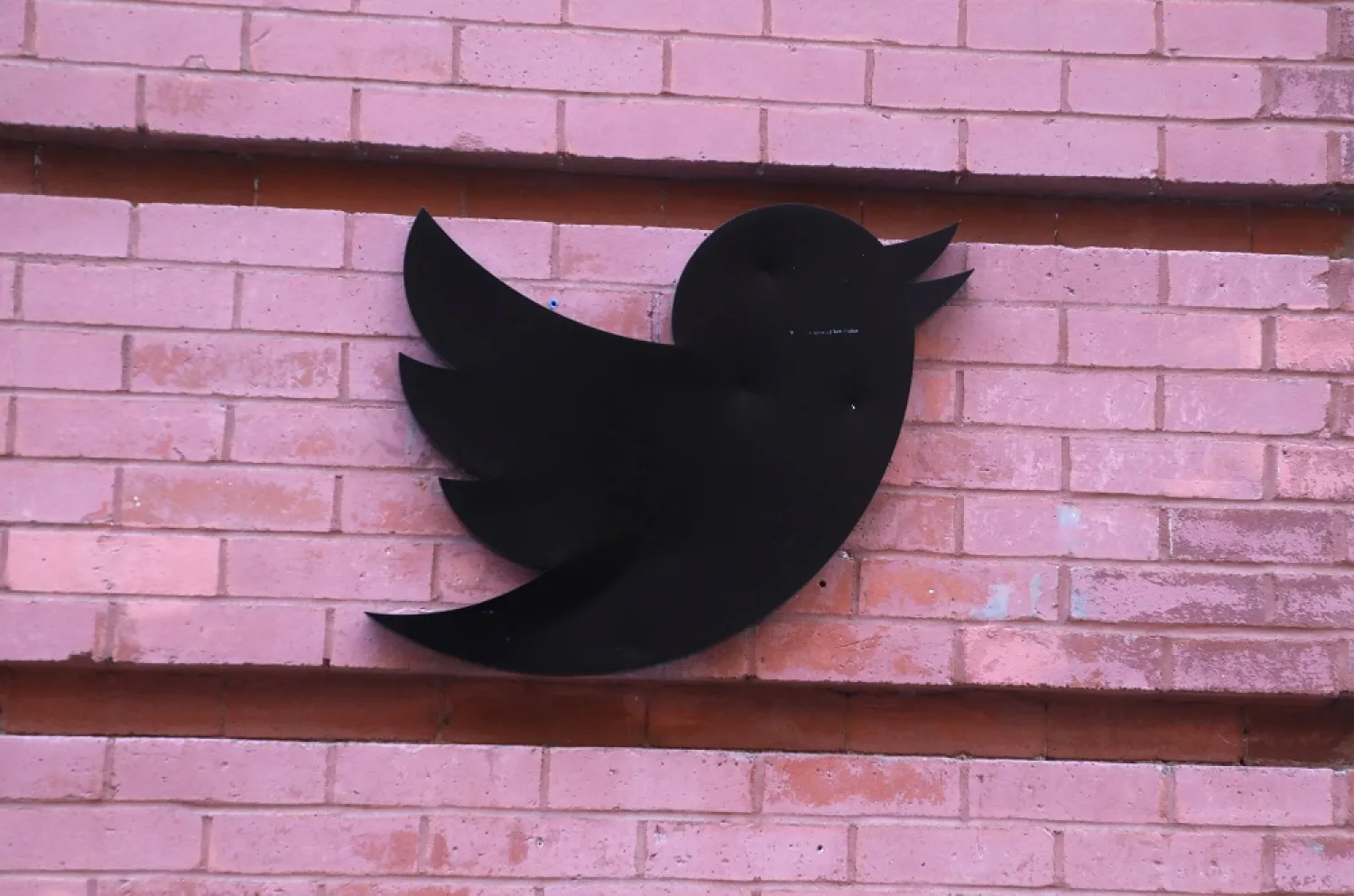 04 November 2022, US, New York: The Twitter logo hangs outside its offices at 249 17th Street in Chelsea, New York. (dpa)