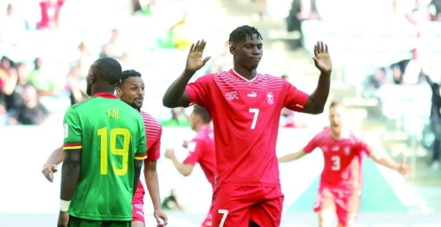 بريل إيمبولو بعد هدفه في شباك الكاميرون (رويترز)