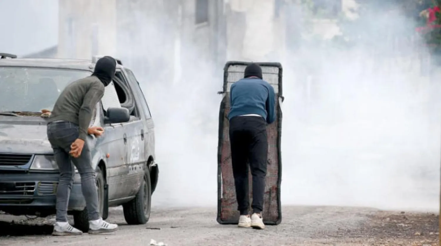 Nablus yakınlarındaki Kafr Kaddum'daki yerleşimcilere karşı dün Filistinlilerin düzenlediği protestolardan bir kare (EPA)