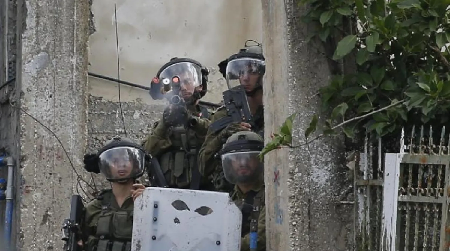 İsrail askerleri 25 Kasım’da Nablus yakınlarındaki Kafr Kaddum’da (EPA)