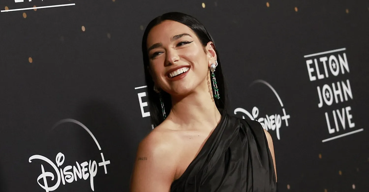 English singer Dua Lipa arrives for the “Elton John Live: Farewell from Dodger Stadium,” the last US performance by the British singer during his "Farewell Yellow Brick Road Tour," in Los Angeles on November 20, 2022. (AFP)