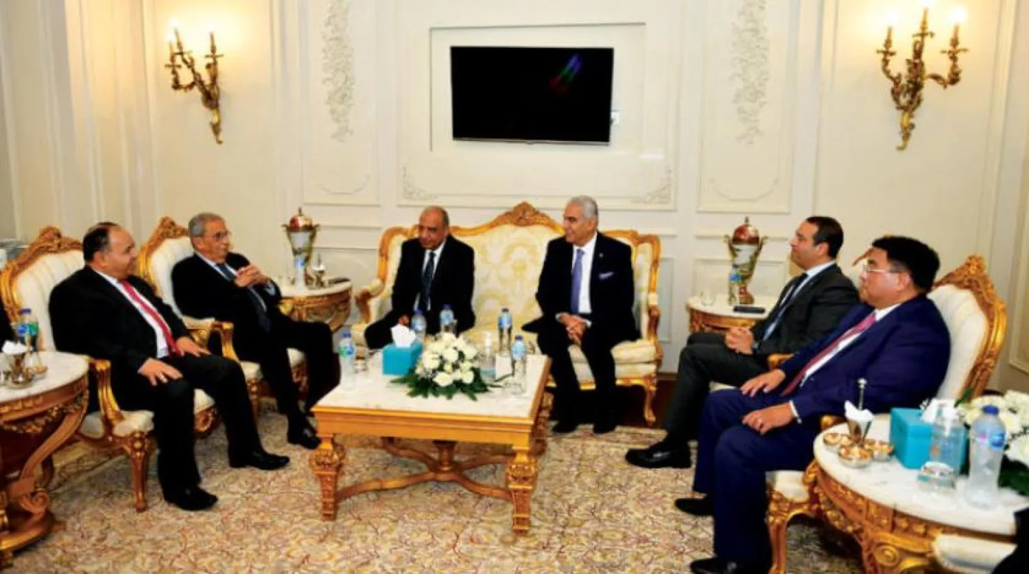 Egypt’s Minister of Finance Mohamed Maait and Amr Moussa meet with the founders of the Egyptian-Chinese Entrepreneurs Association on Monday. (Asharq Al-Awsat) 