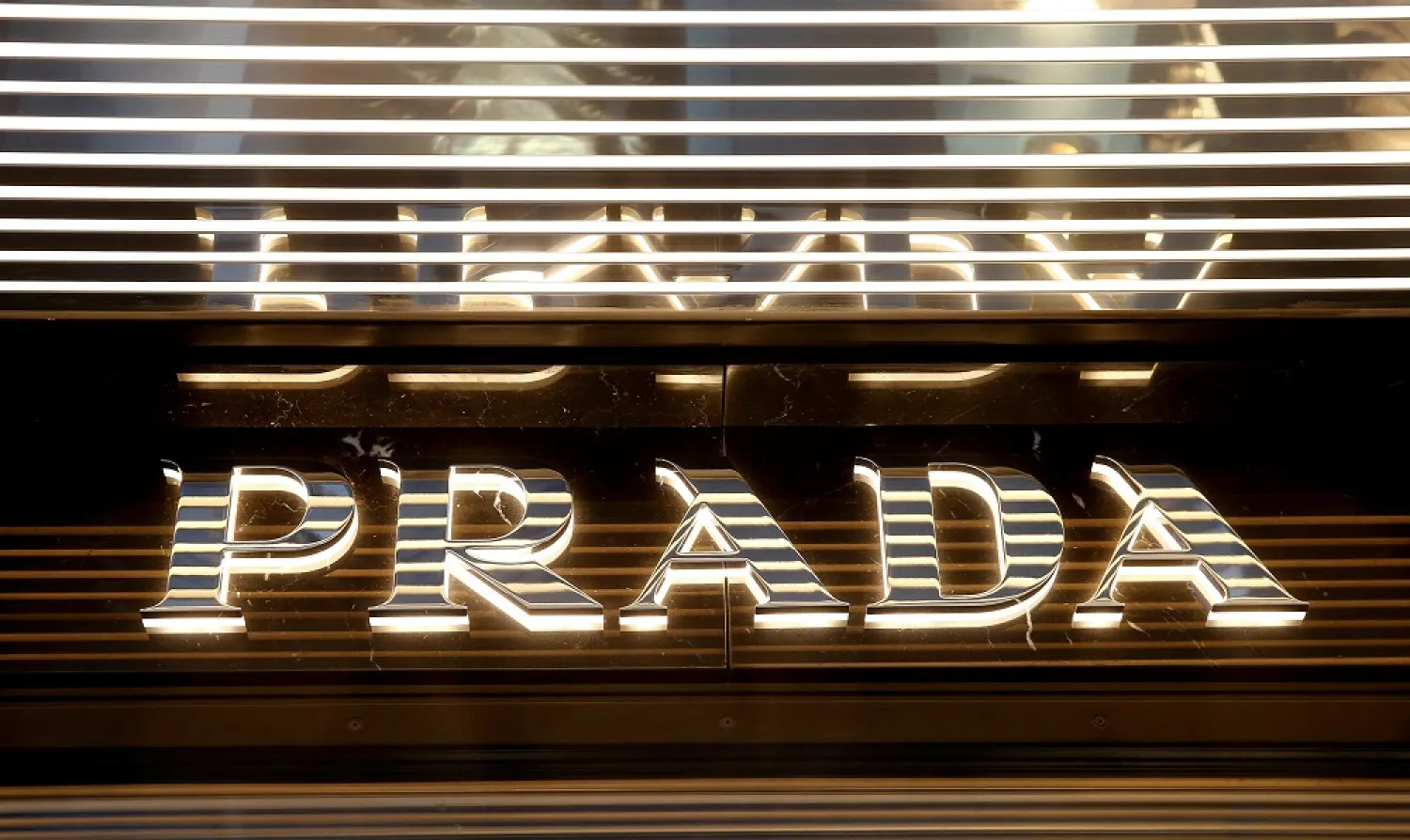 Italian luxury fashion house Prada's logo is seen at a store in Zurich, Switzerland October 26, 2016. (Reuters)