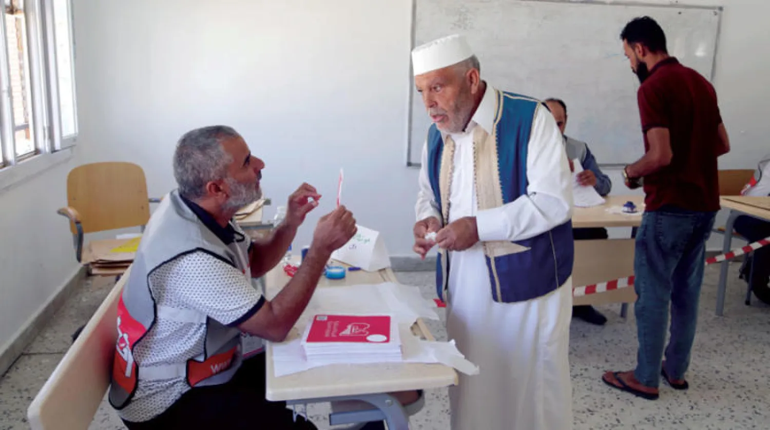 مشهد انتخاب يتمنى معظم الليبيين استعادته (أ.ب)