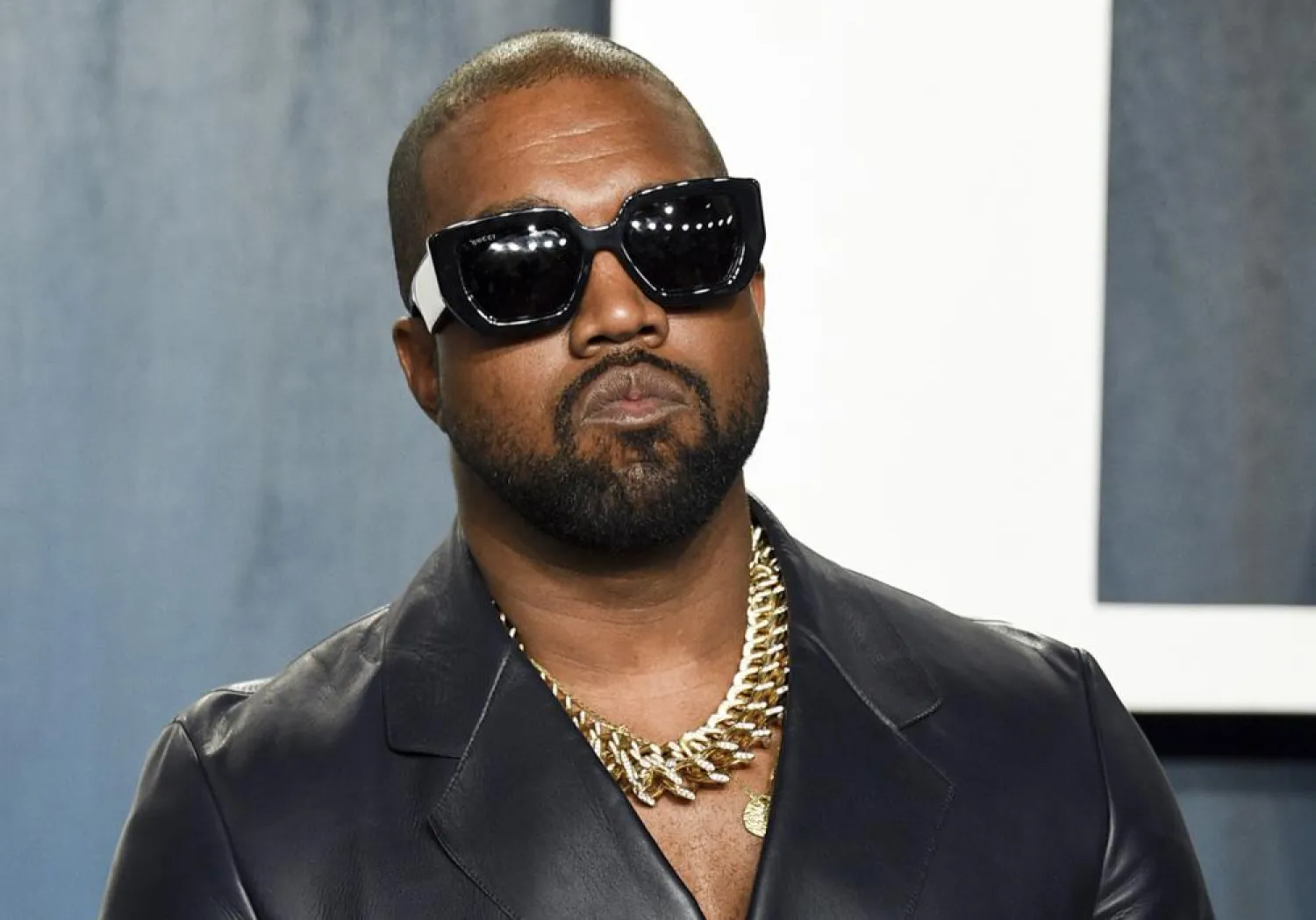 FILE - In this Feb. 9, 2020, file photo, Kanye West arrives at the Vanity Fair Oscar Party in Beverly Hills, Calif. On Monday, Oct. 18, 2021, a Los Angeles judge approved the request of the rapper, producer and fashion designer to legally change his name to just Ye, spelled Y-E, with no middle or last name. (Photo by Evan Agostini/Invision/AP, File)
