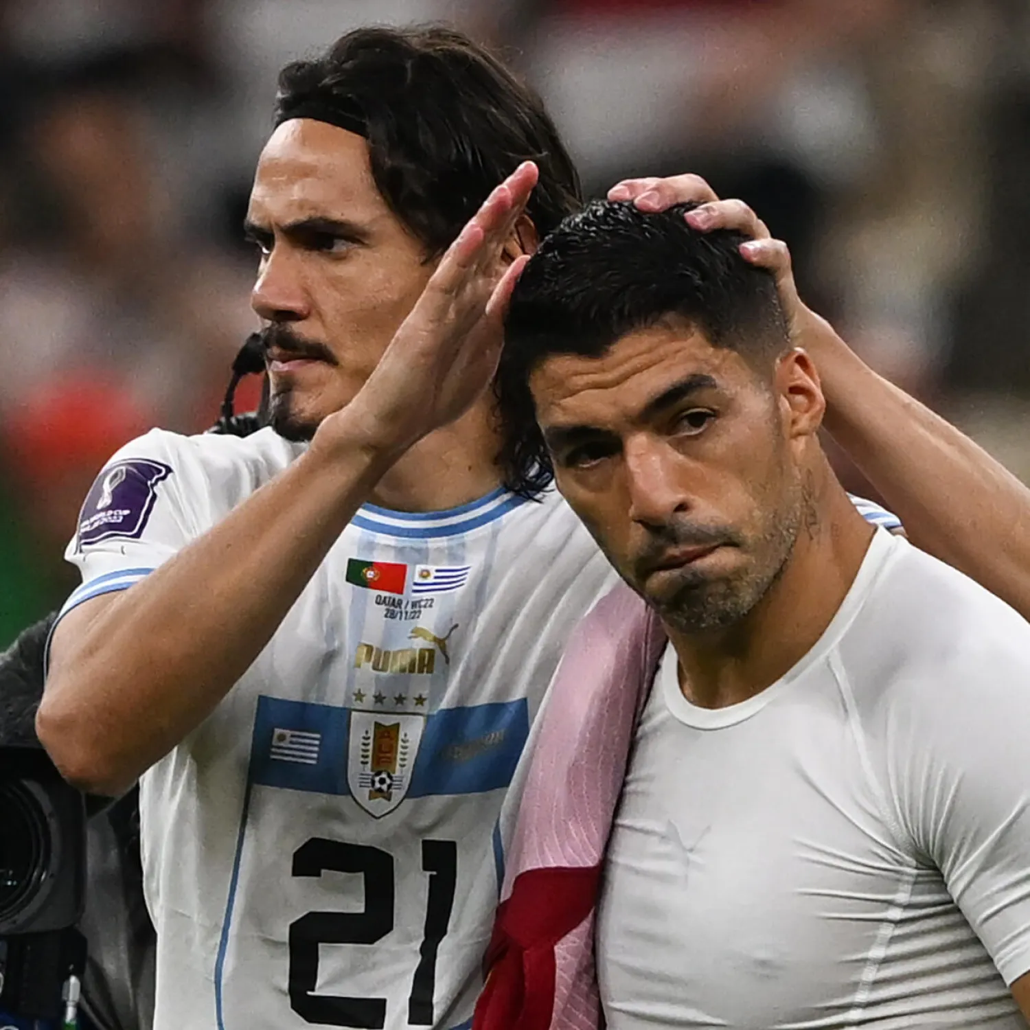 Edinson Cavani (L) and Luis Suarez hope to drag Uruguay into the World Cup last 16. Pablo PORCIUNCULA / AFP
