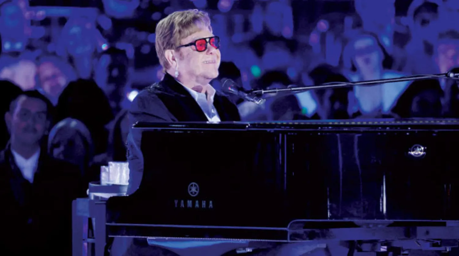 إلتون جون خلال تكريمه في البيت الأبيض في شهر سبتمبر الماضي (رويترز)