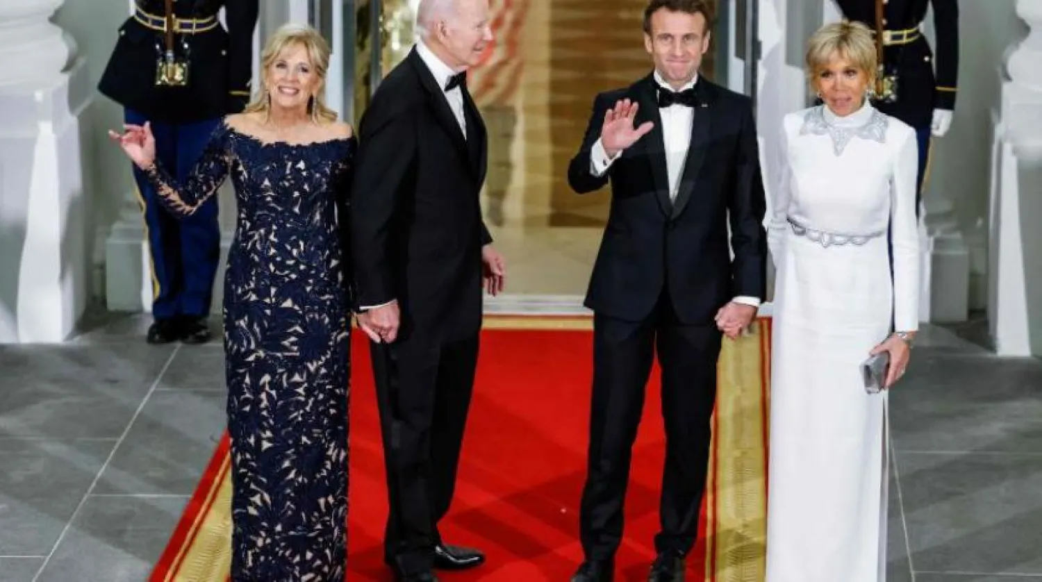 Emmanuel Macron ve eşi Brigitte, Joe Biden ve eşi Jill Beyaz Saray’daki yemek öncesi (AFP)