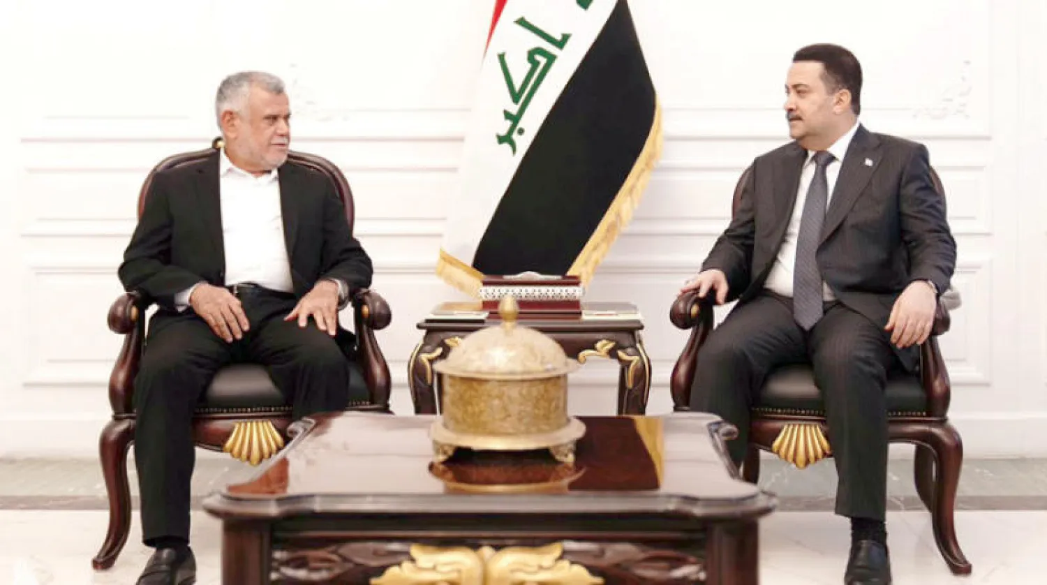 السوداني ورئيس «تحالف الفتح» هادي العامري خلال لقائهما أمس (وكالة الأنباء العراقية)