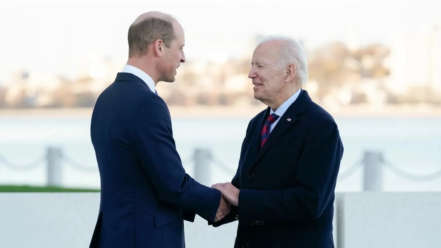 President Joe Biden shakes hands with Britain’s Prince William as they meet outside the John F. Kennedy Presidential Library and Museum, Friday, Dec. 2, 2022, in Boston. AP