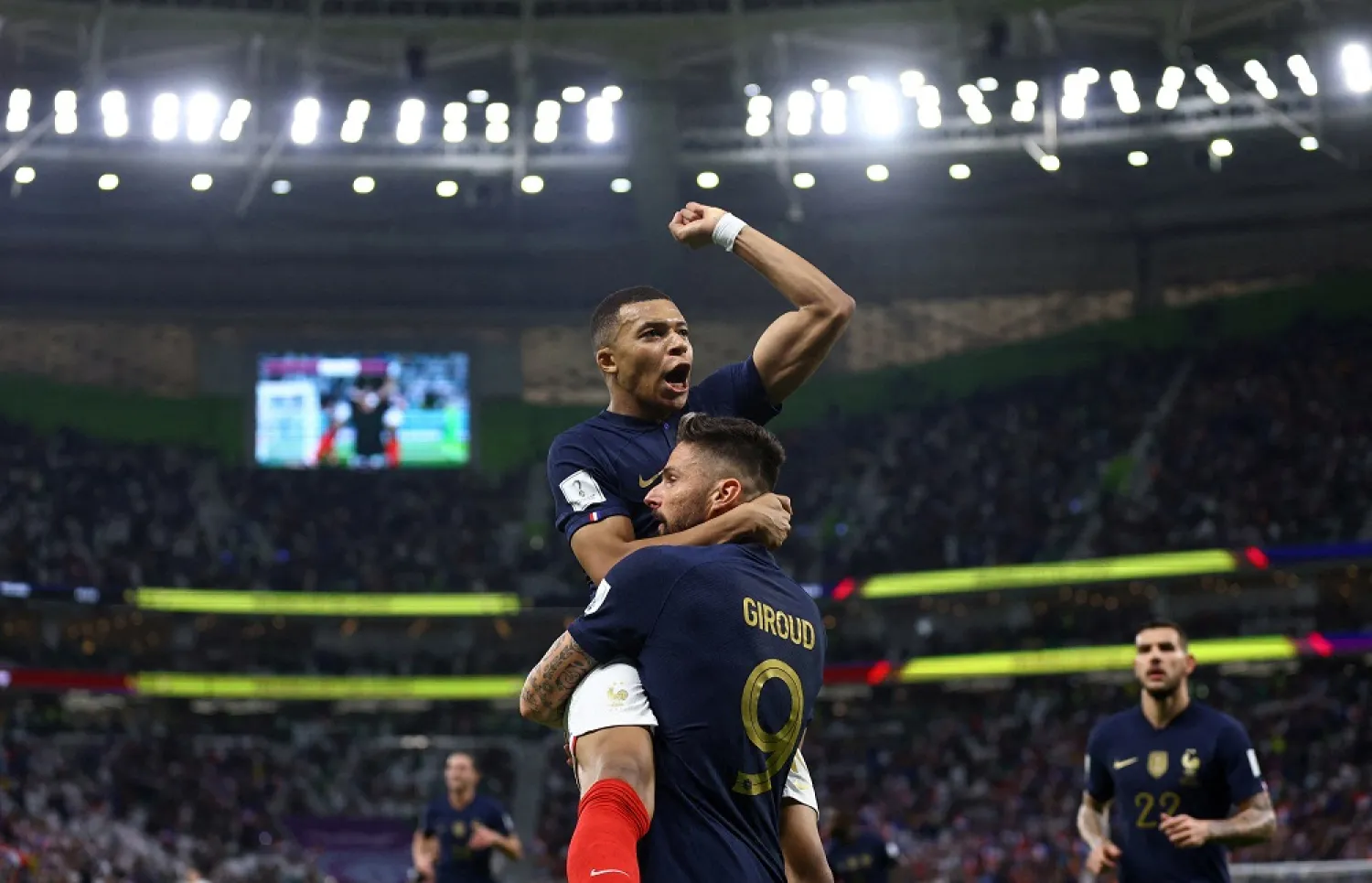 Football - FIFA World Cup Qatar 2022 - Round of 16 - France v Poland - Al Thumama Stadium, Doha, Qatar - December 4, 2022 France's Olivier Giroud celebrates scoring their first goal with teammate Kylian Mbappé. (Reuters)