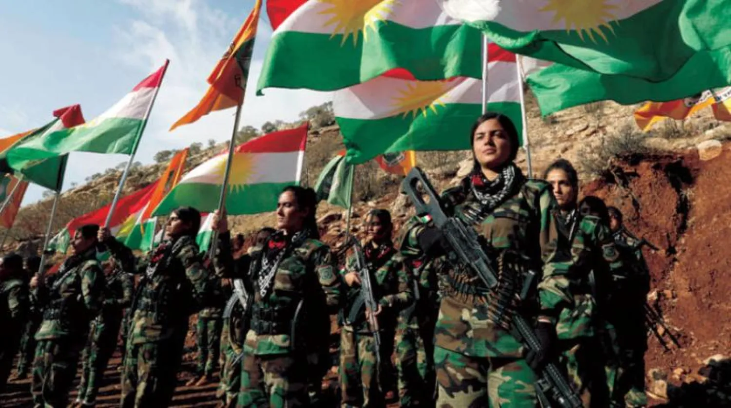 Kurdish Peshmerga fighters are seen at a base at an undisclosed location in the Erbil province in this photo released in December. (AFP)