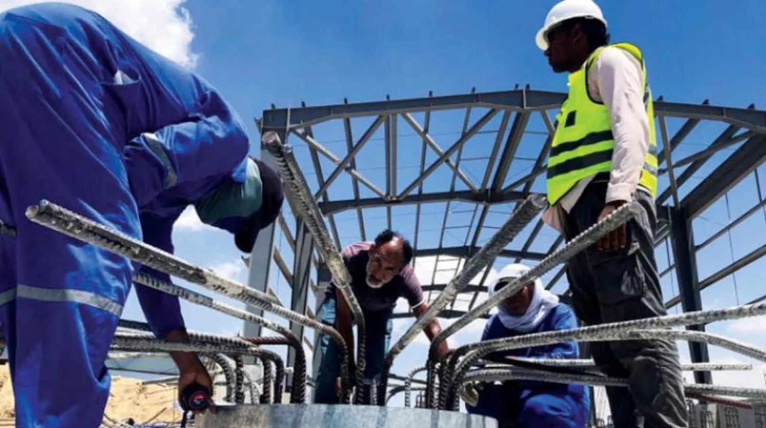 Construction workers in an industrial area near the Suez Canal (Reuters)

