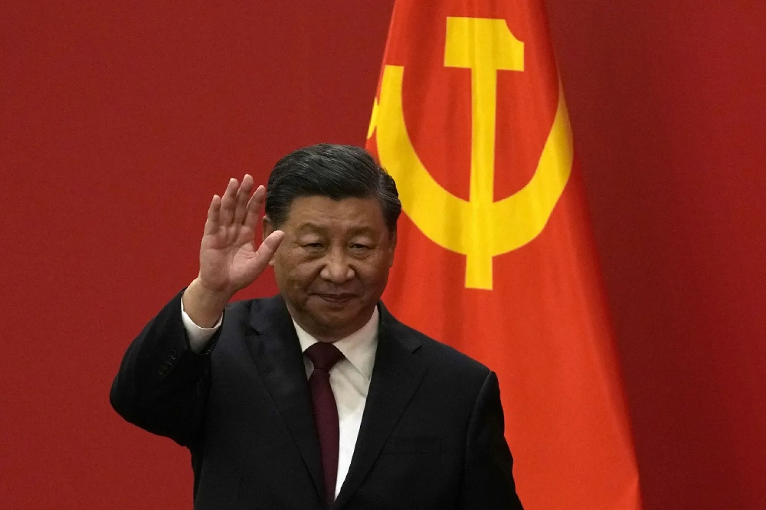 Chinese President Xi Jinping waves at an event to introduce new members of the Politburo Standing Committee at the Great Hall of the People in Beijing on Oct. 23, 2022. (AP)