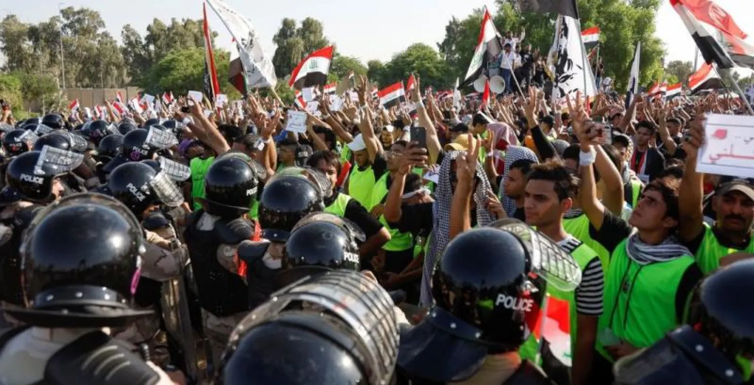 من مواجهات سابقة في بغداد بين متظاهرين عراقيين وقوات الأمن (رويترز)