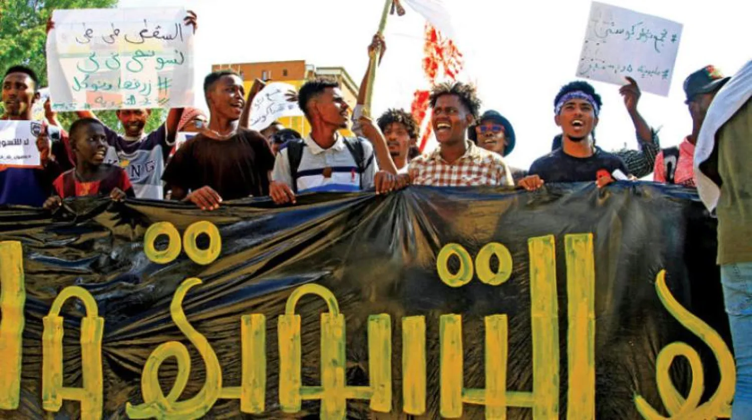 5 Aralık'ta Hartum'da ‘Çerçeve Anlaşmaya’ karşı yapılan yürüyüşten bir görüntü (AFP)