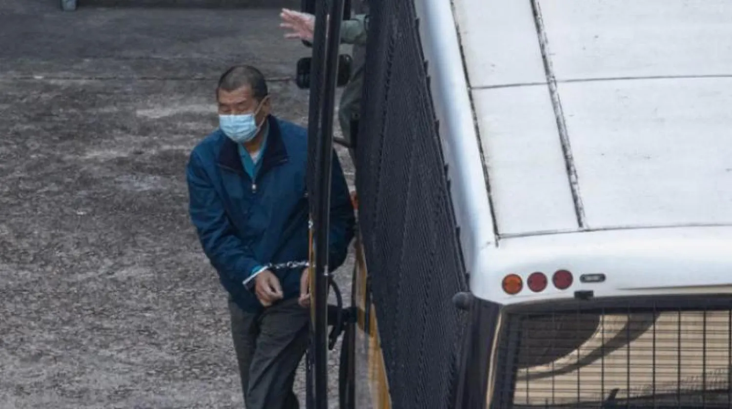 جيمي لاي مكبّل اليدين (إ.ب.أ)