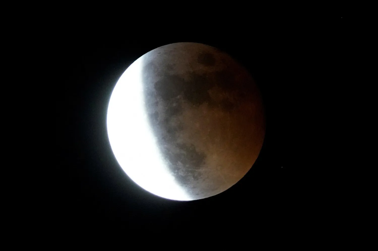 A moon is seen during a lunar eclipse, in Shanghai, China November 8, 2022. (Reuters)